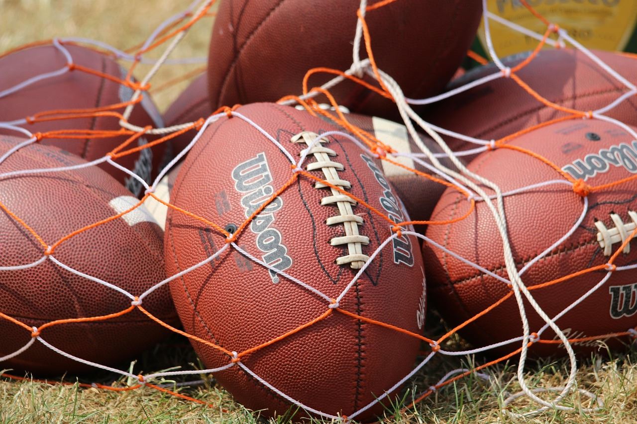 A pile of footballs. 